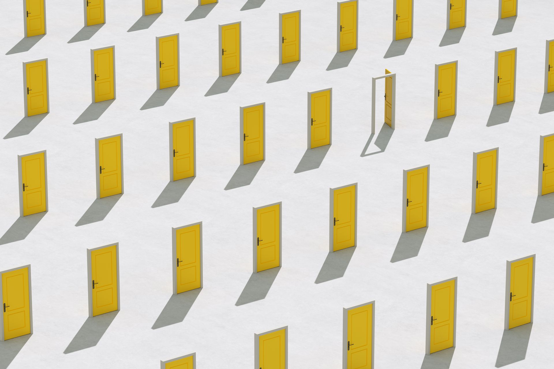 Several rows of freestanding yellow doors, with one open, to represent decision-making