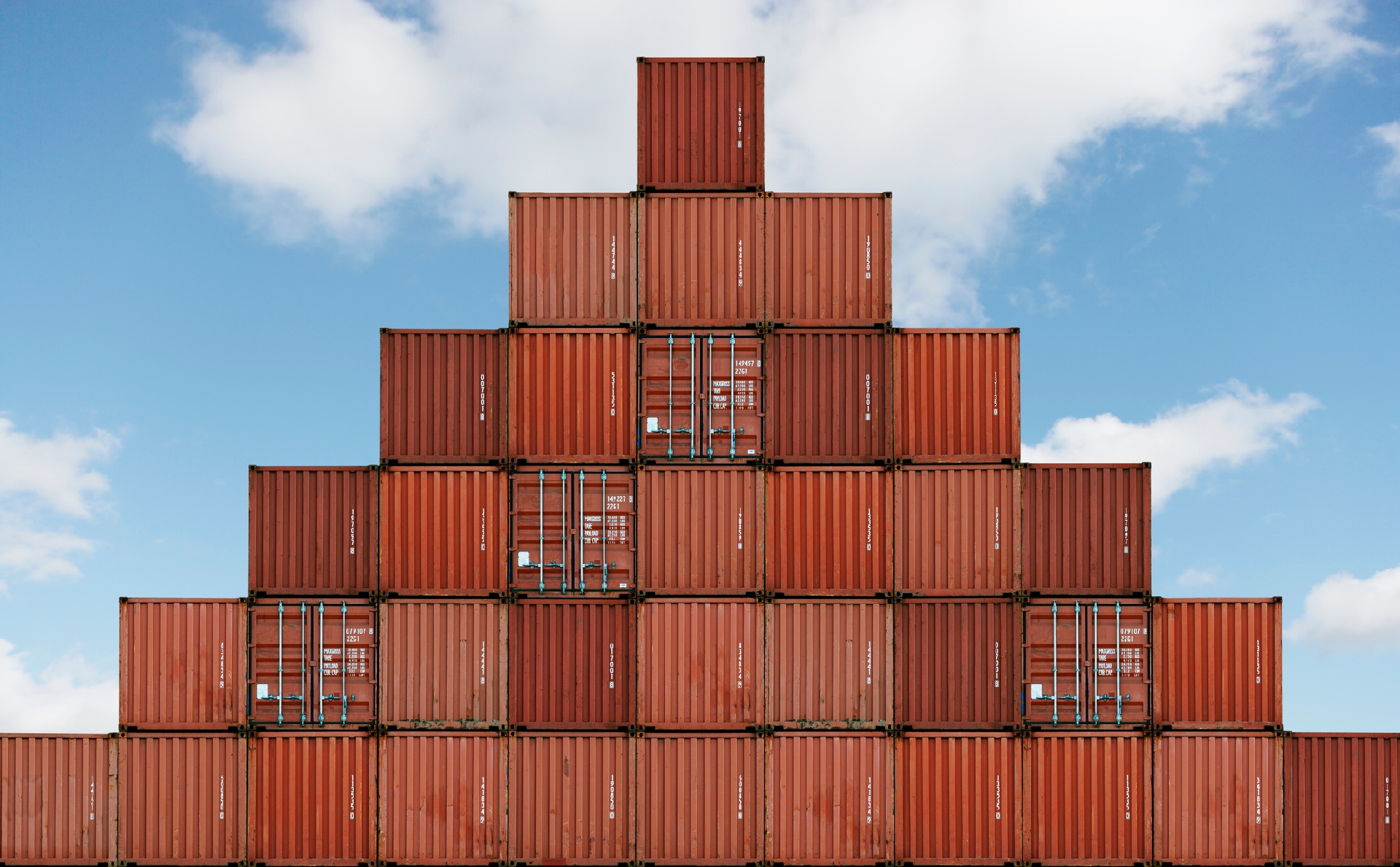 Photo of stacked shipping containers